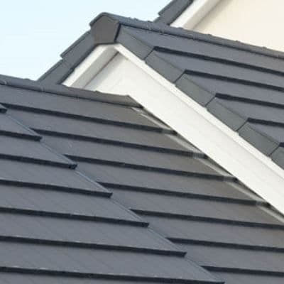 concrete tile roofing style by Donnelly Stucco & Exteriors